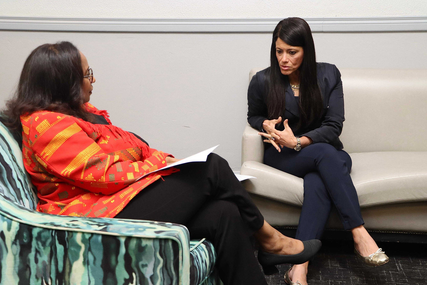 Two professionals discussing mental health support for Personal Counseling Concierge service